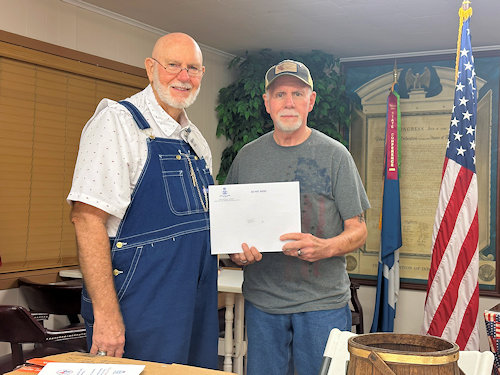 Adjutant Rodney Love receives his Supplemental Certificate on his ancestor, Jacob Holland  from Chapter Registrar, Compatriot Dennis Beckham.