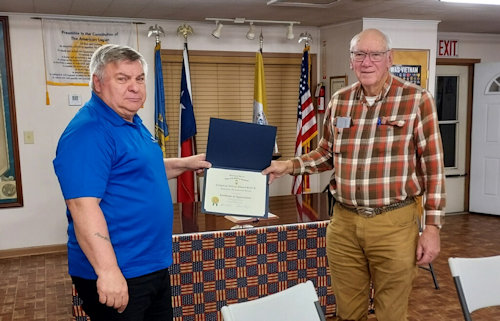 President Clarence V. Burns presents a Certificate of Appreciation to Chancellor Bill Sekel.