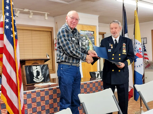 President Clarence Burns presents a Certificate of Appreciation to Chaplain Jim Burns.